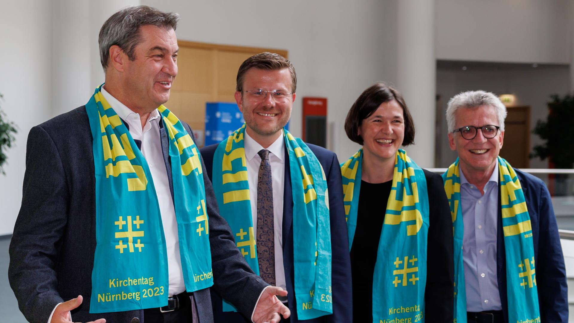 Markus Söder (lr, CSU), Ministerpräsident von Bayern, Marcus König (CSU), Oberbürgermeister von Nürnberg, Kristin Jahn, Generalsekretärin des Deutschen Evangelischen Kirchentags, und Thomas de Maizière, Präsident des Deutschen Evangelischen Kirchentags, bei der 38. Deutscher Evangelischer Kirchentag 2023 in Nürnberg. Markus Söder (lr, CSU), Ministerpräsident von Bayern, Marcus König (CSU), Oberbürgermeister von Nürnberg, Kristin Jahn, Generalsekretärin des Deutschen Evangelischen Kirchentags, und Thomas de Maizière, Präsident des Deutschen Evangelischen Kirchentags, bei der 38. Deutscher Evangelischer Kirchentag 2023 in Nürnberg.