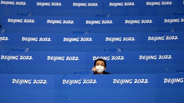 BEIJING, CHINA - FEBRUARY 19, 2022: A journalist is seen during the men s bronze medal Ice hockey, Eishockey match betwe