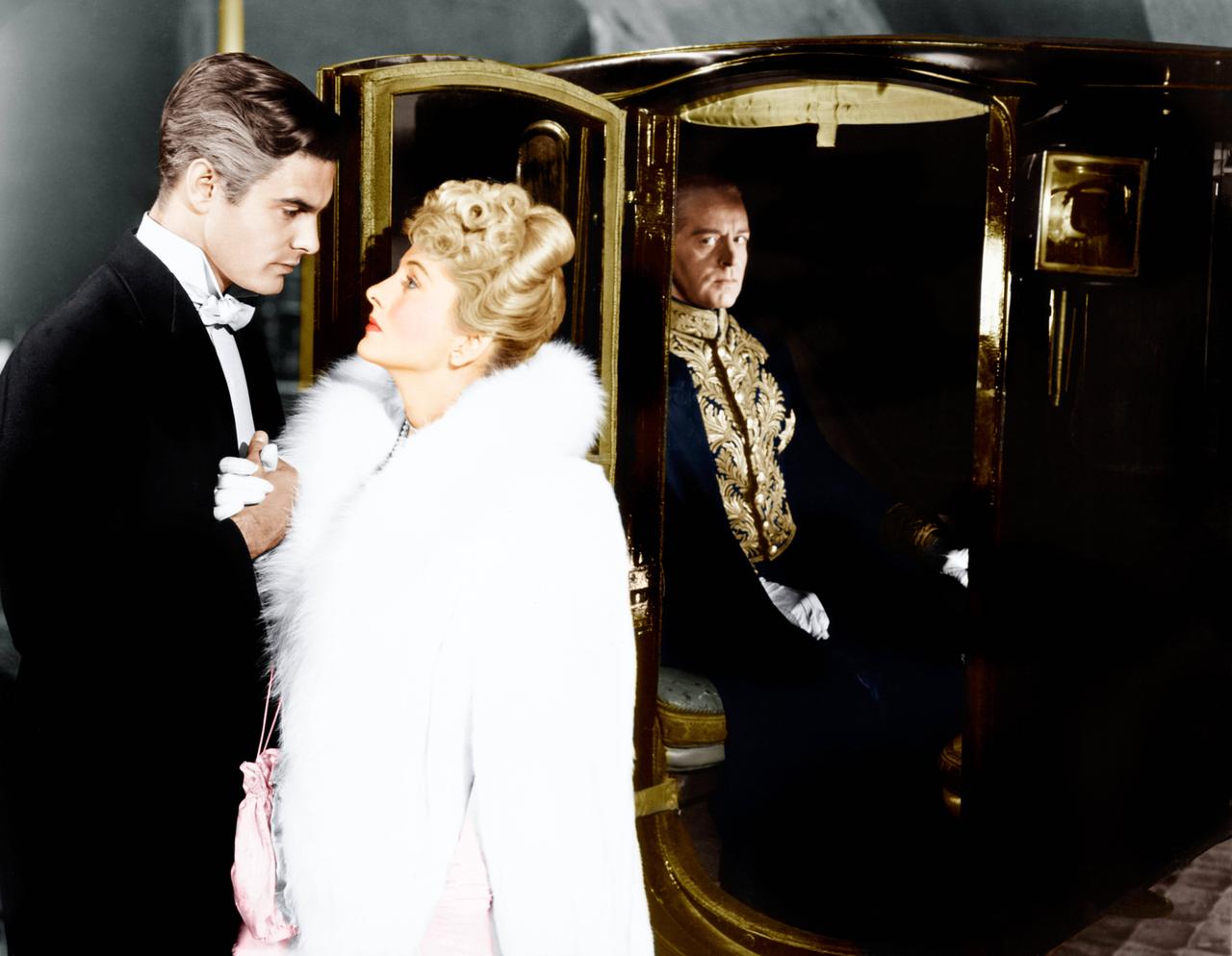 Filmszene aus "BRIEF VON EINER UNBEKANNTEN FRAU" aus dem Jahr 1948. Von links: Louis Jordan, Joan Fontaine, Marcel Journet. Filmszene aus "BRIEF VON EINER UNBEKANNTEN FRAU" aus dem Jahr 1948. Von links: Louis Jordan, Joan Fontaine, Marcel Journet.