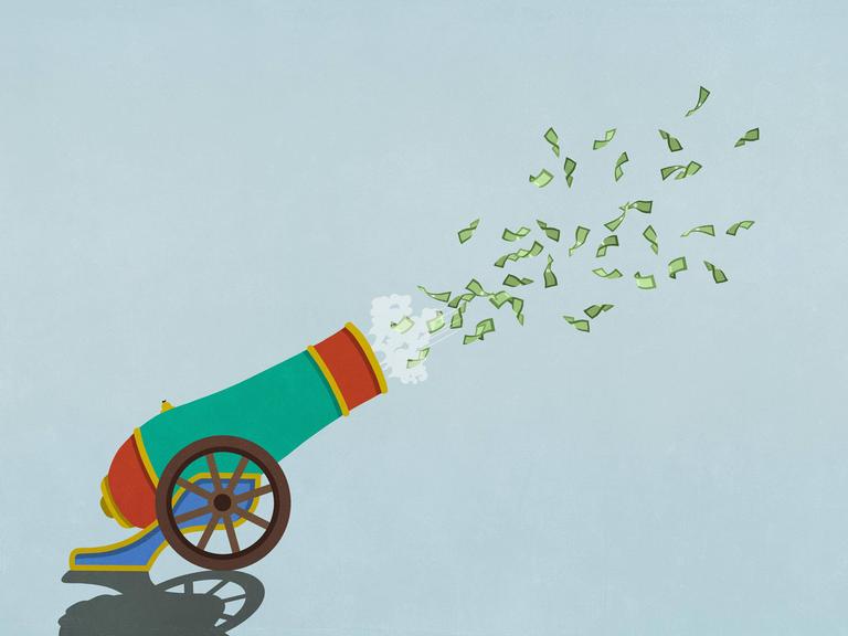 Geld fliegt aus einer Kanone