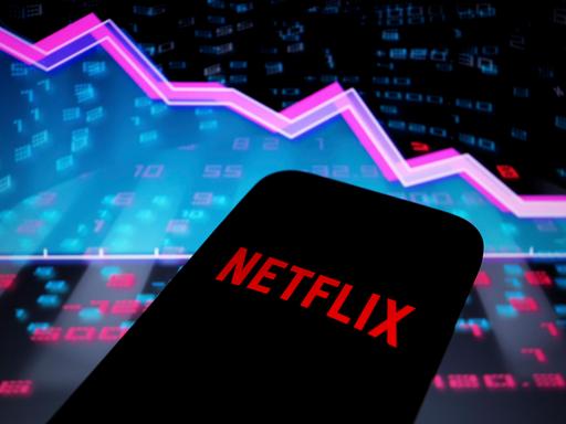 April 20, 2022, Asuncion, Paraguay: Illustration: Logo of Netflix displayed on a smartphone backdropped by abstract pres