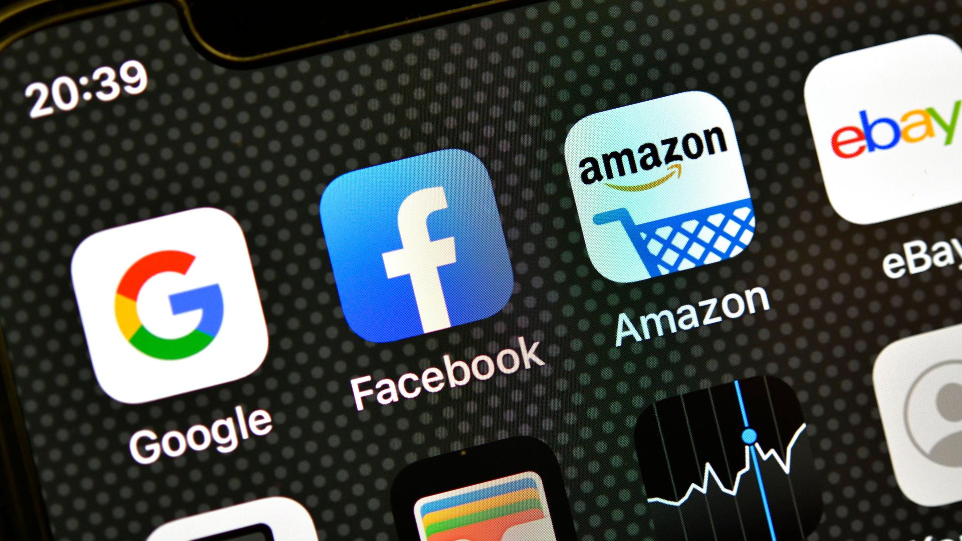 Diverse Apps auf dem Display eines iPhones Diverse Apps auf dem Display eines iPhones