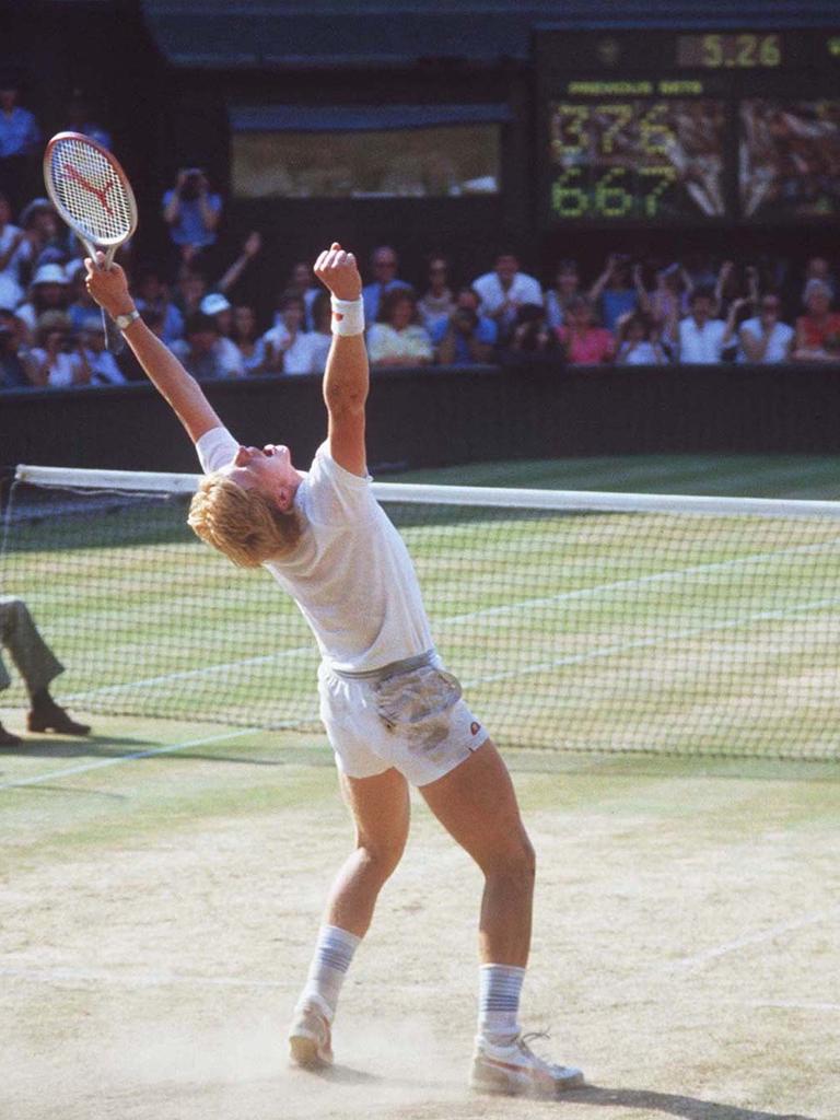 1985: Boris Becker bejubelt seinen Sieg beim Wimbledon-Turnier. 