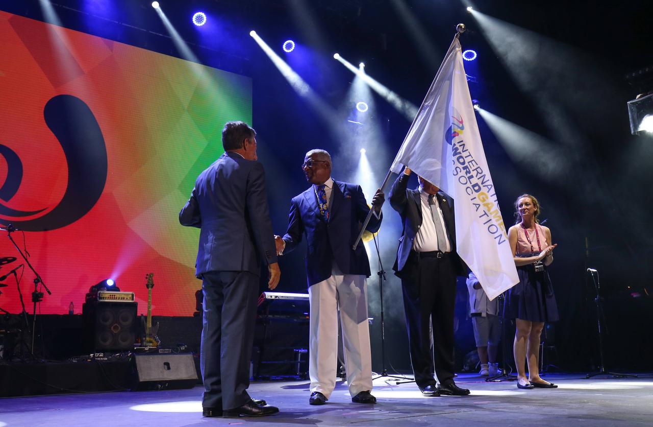 Birmingham Mayor William A. Bell with the World Games flag at the 2017 World Games closing ceremony in Wroclaw