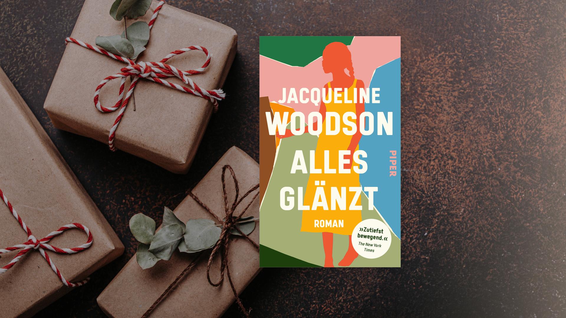 Das Cover des Buches "Alles glänzt" von Jacqueline Woodson auf einem adventlichen Hintergrund. Das Cover des Buches "Alles glänzt" von Jacqueline Woodson auf einem adventlichen Hintergrund.