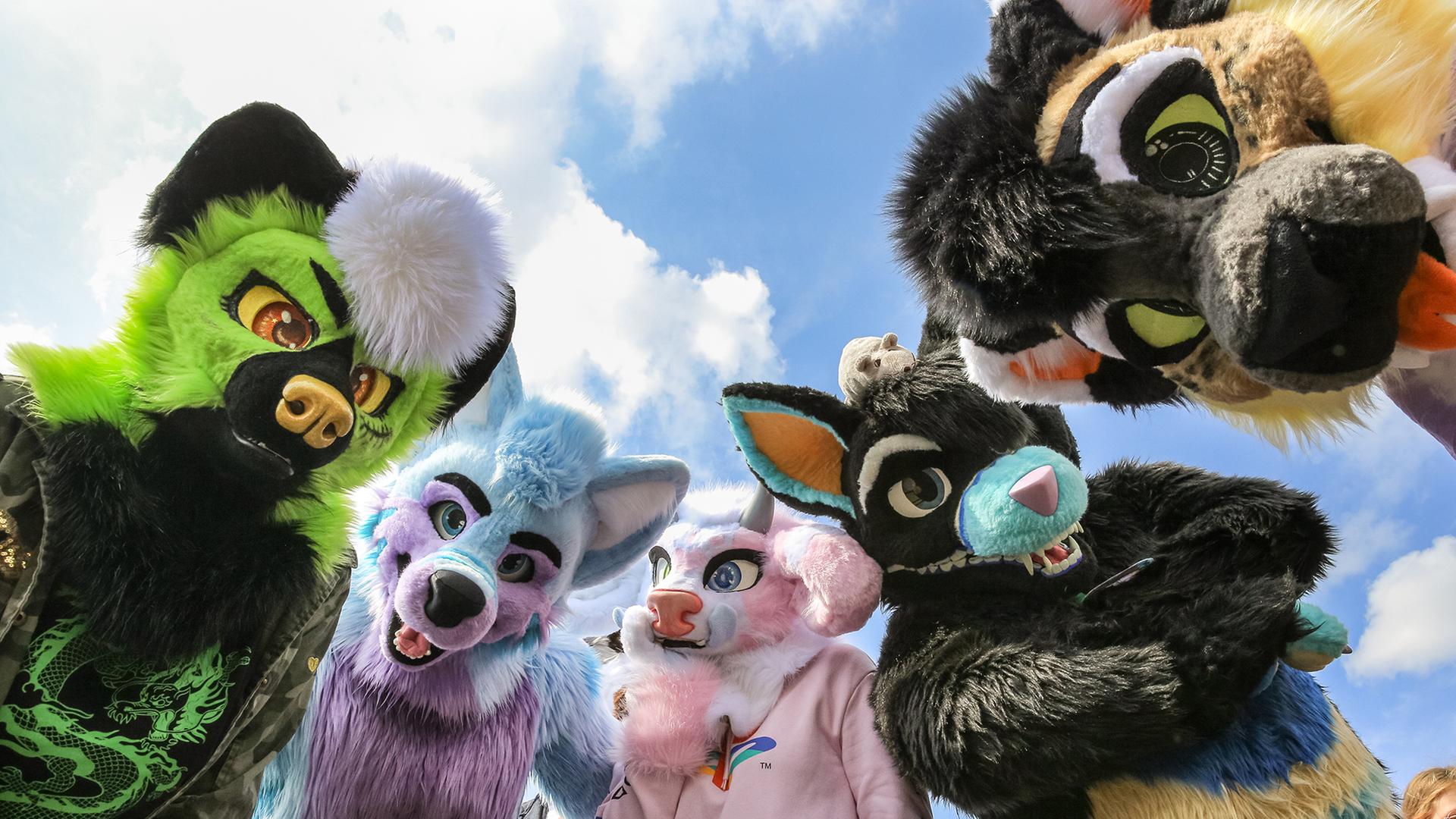 Düsseldorf, NRW, Germany, 21st May 2022. A group of characters in "fur suits" have fun with the camera despite their warm, furry outfits. Tens of thousands of visitors and cosplayers enjoy the warm sunshine along the river Rhine embankment in their outfits inspired by Japanese anime, video and games. Stage performances, cosplay, stalls and demonstrations of Japanese culture, sports and traditions are featured at DÃ_sseldorf's annual Japan Day, celebrating Japan and the Japanese community in the city. Düsseldorf is home to the largest Japanese community in Germany., Credit:Christine Ongsiek / Avalon Düsseldorf, NRW, Germany, 21st May 2022. A group of characters in "fur suits" have fun with the camera despite their warm, furry outfits. Tens of thousands of visitors and cosplayers enjoy the warm sunshine along the river Rhine embankment in their outfits inspired by Japanese anime, video and games. Stage performances, cosplay, stalls and demonstrations of Japanese culture, sports and traditions are featured at DÃ_sseldorf's annual Japan Day, celebrating Japan and the Japanese community in the city. Düsseldorf is home to the largest Japanese community in Germany., Credit:Christine Ongsiek / Avalon