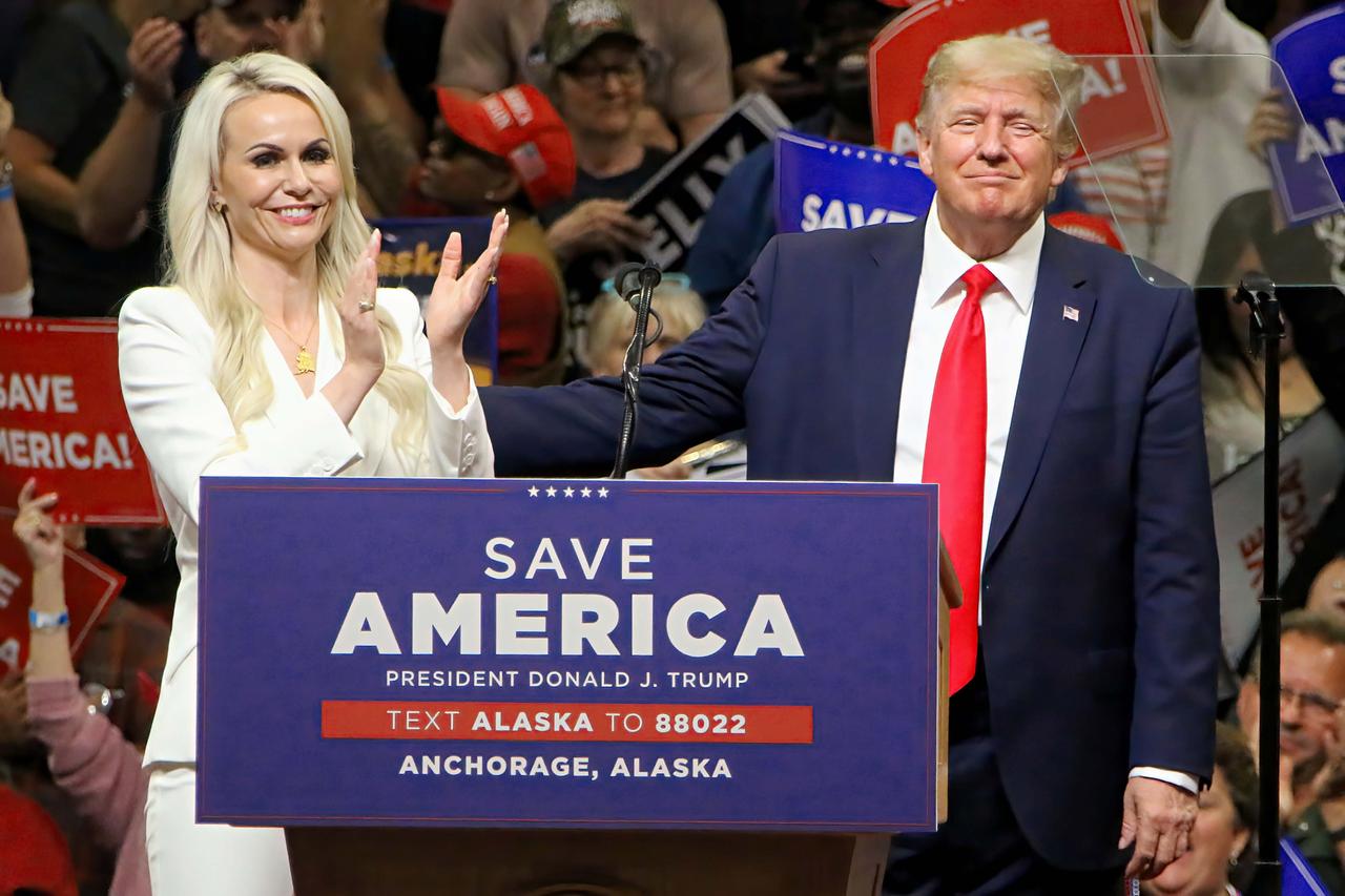 Kelly Tshibaka stands with President Donald Trump during a Save America rally in Anchorage, Alaska Saturday July 9 2022. Kelly, who is endorsed Trump, is running for Alaska's senate seat against incumbent Sen. Lisa Murkowski. (Credit Image: © Al Grillo/ZUMA Press Wire Service/ZUMAPRESS.com Kelly Tshibaka stands with President Donald Trump during a Save America rally in Anchorage, Alaska Saturday July 9 2022. Kelly, who is endorsed Trump, is running for Alaska's senate seat against incumbent Sen. Lisa Murkowski. (Credit Image: © Al Grillo/ZUMA Press Wire Service/ZUMAPRESS.com