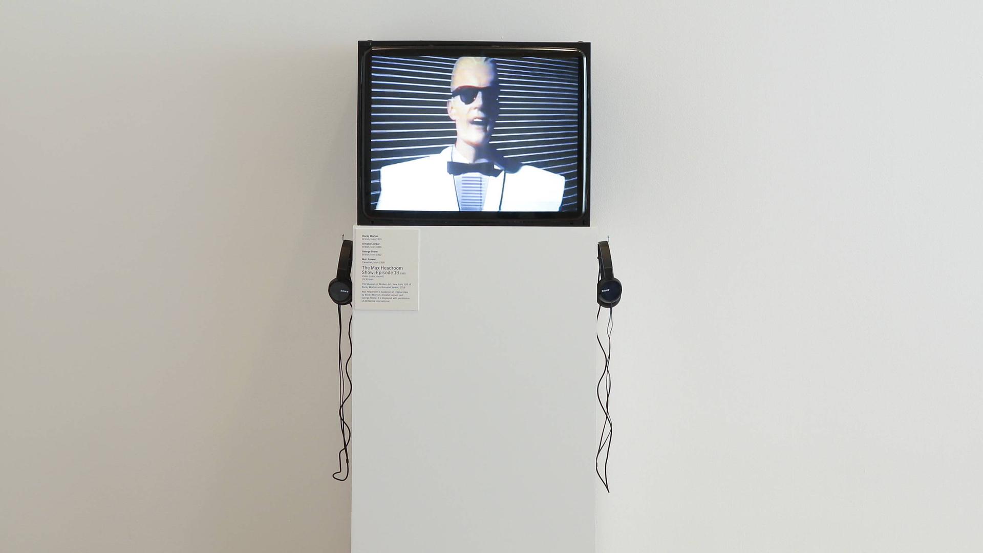 Die TV-Figur "Max Headroom" ist auf einem Bildschirm zu sehen. Die TV-Figur "Max Headroom" ist auf einem Bildschirm zu sehen.