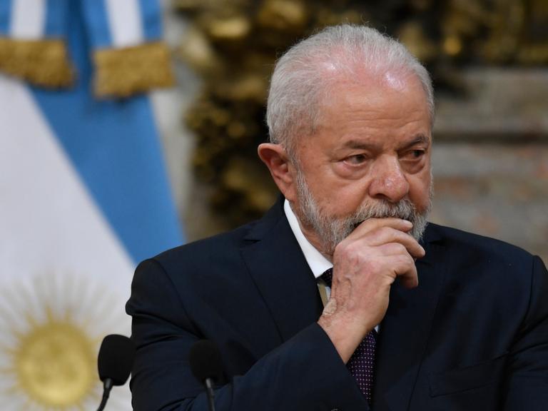 Brazilian President Luiz Inacio Lula da Silva gestures at the government house in Buenos Aires, Argentina, as he gives a joint statement with Argentina's President Alberto Fernandez, Monday, Jan. 23, 2023. (AP Photo/Gustavo Garello)