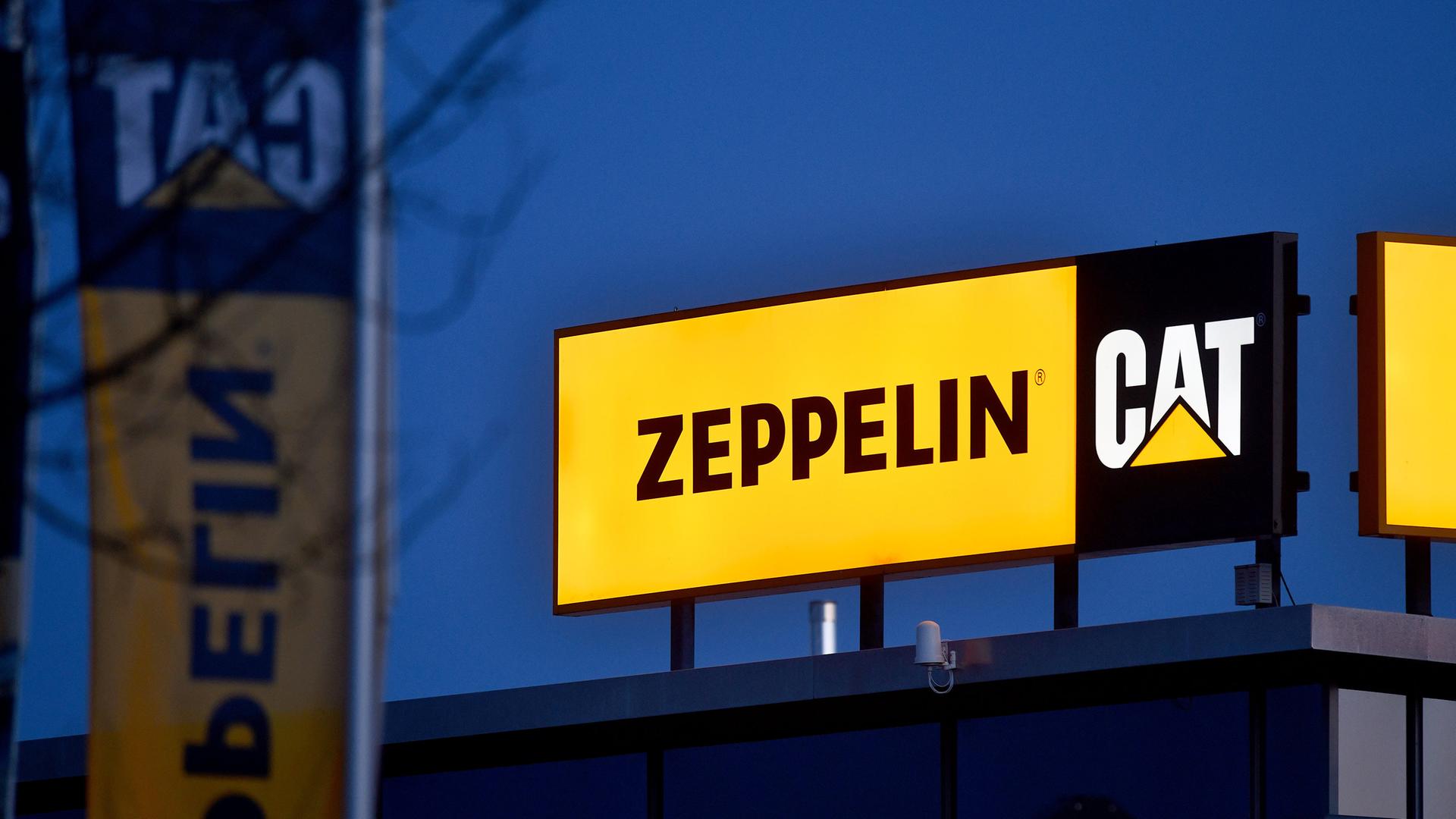 Das Firmengebäude der Firma Zeppelin Baumaschinen GmbH CAT in Garching bei München (Symbolbild). Das Firmengebäude der Firma Zeppelin Baumaschinen GmbH CAT in Garching bei München (Symbolbild).