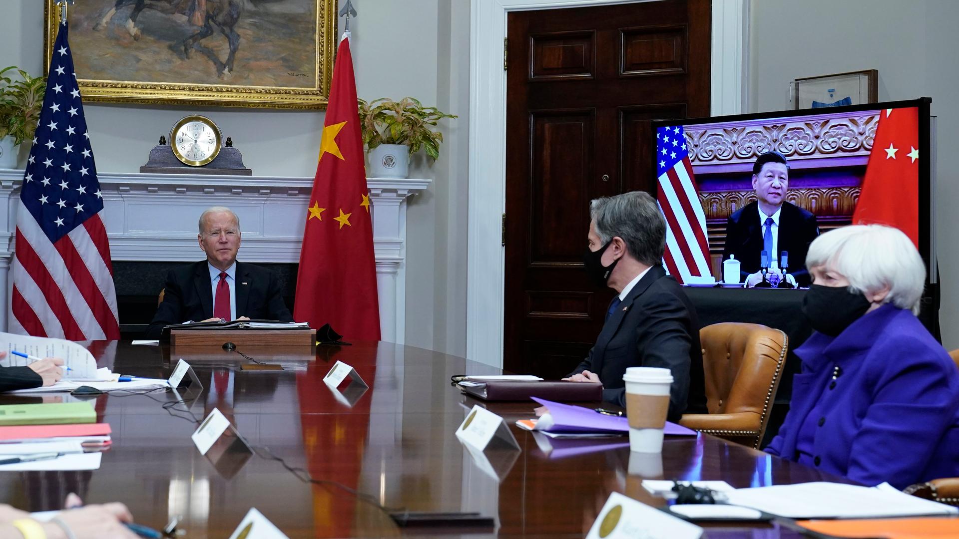 Joe Biden und Xi Jinping bei einem virtuellen Treffen. Joe Biden und Xi Jinping bei einem virtuellen Treffen.