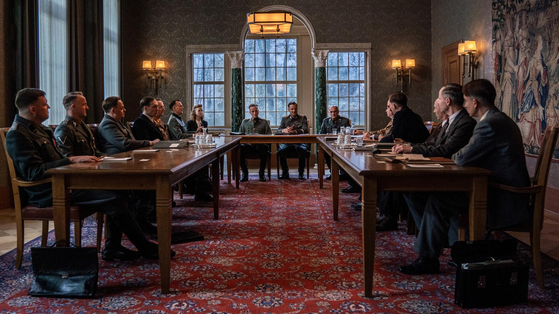 ZDF-Film Die Wannseekonferenz - Von links: Dr. Rudolf Lange (Frederic Linkemann), Dr. Eberhard Schöngarth (Maximilian Brückner), Dr. Josef Bühler (Sascha Nathan), Dr. Georg Leibbrandt (Rafael Stachowiak), Dr. Alfred Meyer (Peter Jordan), Adolf Eichmann (Johannes Allmayer), Ingeburg Werlemann (Lilli Fichtner), Heinrich Müller (Jakob Diehl), Reinhard Heydrich (Philipp Hochmair), Otto Hofmann (Markus Schleinzer), Dr. Gerhard Klopfer (Fabian Busch), Friedrich Wilhelm Kritzinger (Thomas Loibl), Dr. Wilhelm Stuckart (Godehard Giese), Martin Luther (Simon Schwarz), Erich Neumann (Matthias Bundschuh), Dr. Roland Freisler (Arnd Klawitter). ZDF-Film Die Wannseekonferenz - Von links: Dr. Rudolf Lange (Frederic Linkemann), Dr. Eberhard Schöngarth (Maximilian Brückner), Dr. Josef Bühler (Sascha Nathan), Dr. Georg Leibbrandt (Rafael Stachowiak), Dr. Alfred Meyer (Peter Jordan), Adolf Eichmann (Johannes Allmayer), Ingeburg Werlemann (Lilli Fichtner), Heinrich Müller (Jakob Diehl), Reinhard Heydrich (Philipp Hochmair), Otto Hofmann (Markus Schleinzer), Dr. Gerhard Klopfer (Fabian Busch), Friedrich Wilhelm Kritzinger (Thomas Loibl), Dr. Wilhelm Stuckart (Godehard Giese), Martin Luther (Simon Schwarz), Erich Neumann (Matthias Bundschuh), Dr. Roland Freisler (Arnd Klawitter).