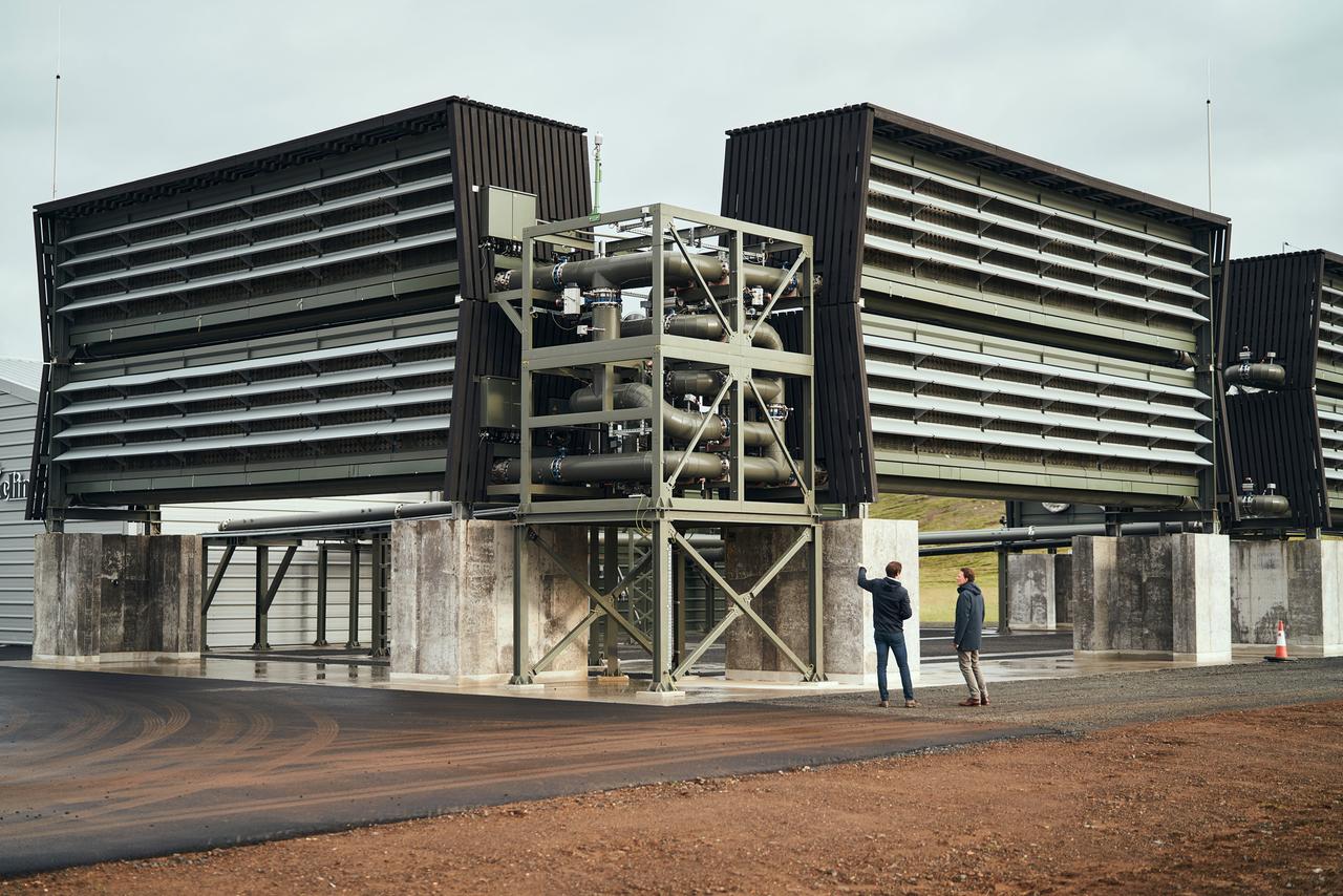 In this September 2021 image provided by Climeworks AG, CEOs Jan Wurzbacher and Christoph Gebald appear in front of an air-scrubbing machine where fans suck air into big, black collection boxes where the carbon dioxide accumulates on a filter at Climeworksâ Orca plant near Reykjavik, Iceland. The Iceland plant is the largest such facility in the world, capturing about 4,000 metric tons of carbon dioxide per year. In this September 2021 image provided by Climeworks AG, CEOs Jan Wurzbacher and Christoph Gebald appear in front of an air-scrubbing machine where fans suck air into big, black collection boxes where the carbon dioxide accumulates on a filter at Climeworksâ Orca plant near Reykjavik, Iceland. The Iceland plant is the largest such facility in the world, capturing about 4,000 metric tons of carbon dioxide per year.