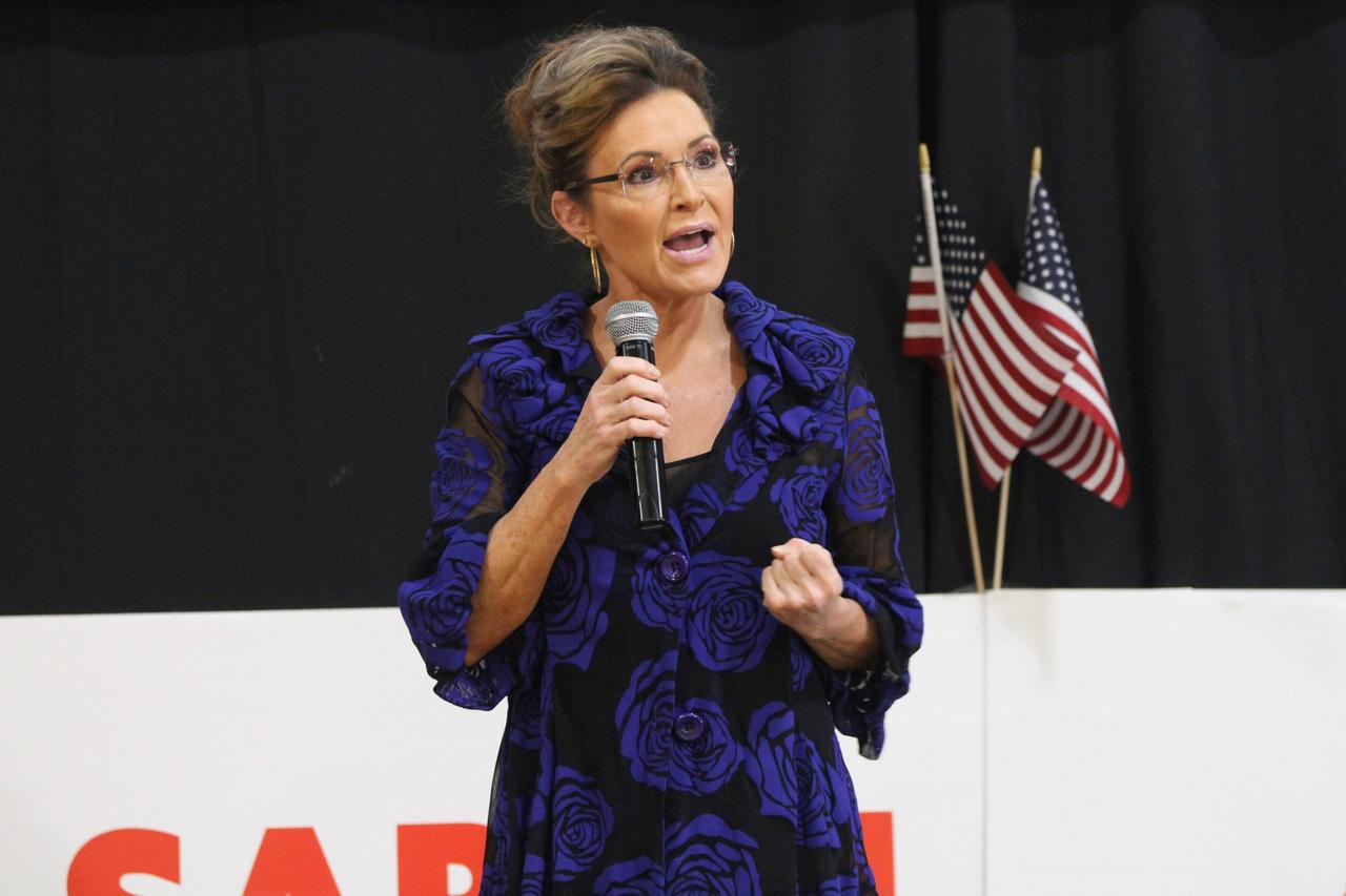 Sarah Palin, a Republican seeking the sole U.S. House seat in Alaska, addresses supporters Thursday, June 2, 2022, in Anchorage, Alaska, during an event that featured former President Donald Trump whose voice was heard over loudspeakers in a church gym. Palin is one of 48 candidates seeking to replace the late U.S. Rep. Don Young who died in March. The top four vote-getters from the June 11 special primary advance to the special election for the seat in August, where ranked choice voting will be used Sarah Palin, a Republican seeking the sole U.S. House seat in Alaska, addresses supporters Thursday, June 2, 2022, in Anchorage, Alaska, during an event that featured former President Donald Trump whose voice was heard over loudspeakers in a church gym. Palin is one of 48 candidates seeking to replace the late U.S. Rep. Don Young who died in March. The top four vote-getters from the June 11 special primary advance to the special election for the seat in August, where ranked choice voting will be used