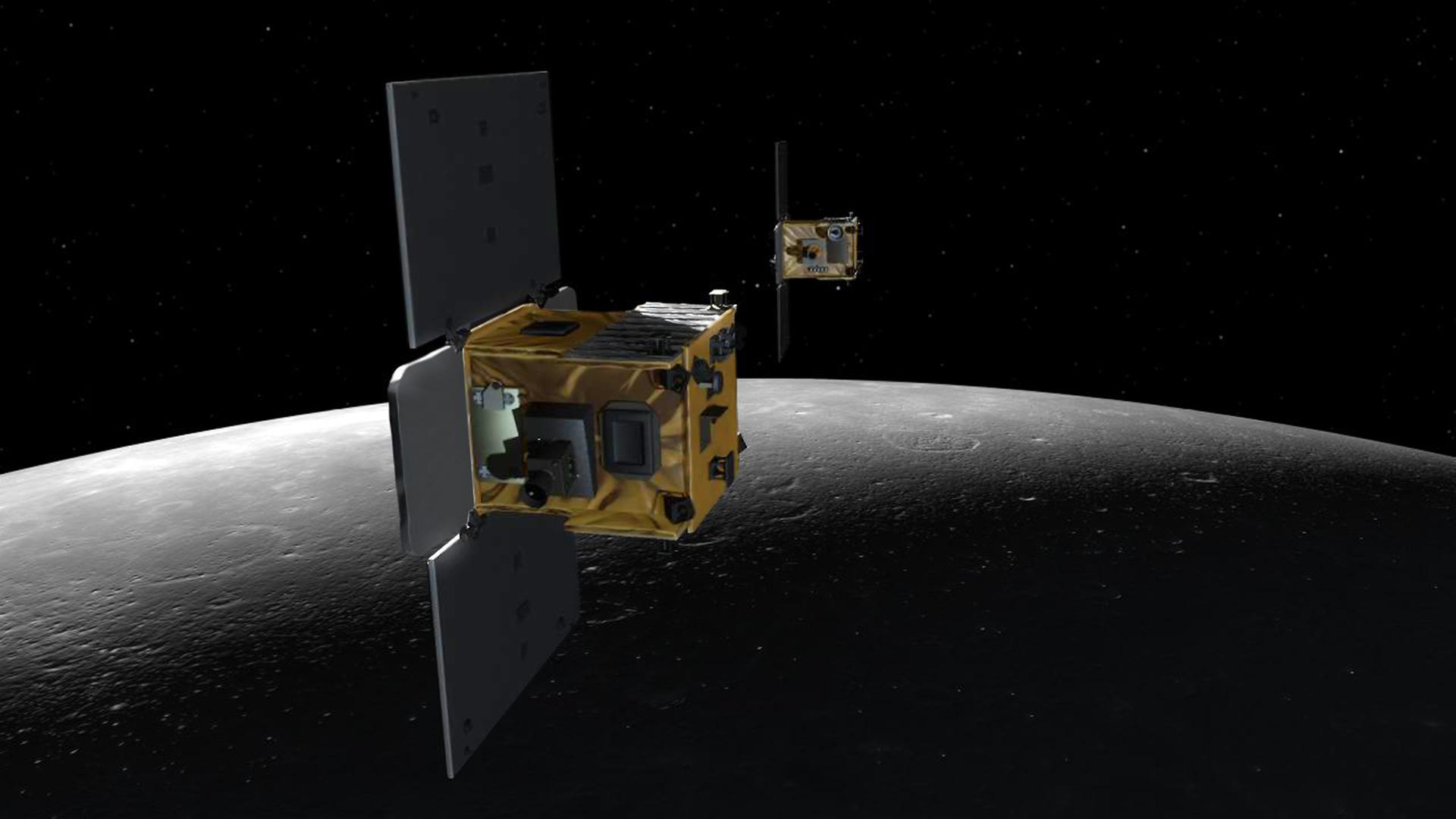 Die beiden GRAIL-Satelliten in der Umlaufbahn um den Mond (Illustration) Die beiden GRAIL-Satelliten in der Umlaufbahn um den Mond (Illustration)