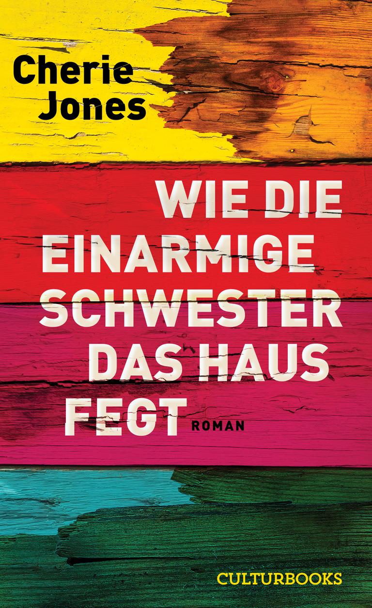 Das Cover des Krimis von Cherie Jones, "Wie die einarmige Schwester das Haus fegt". Es zeigt den Namen der Autorin und den Titel auf einem mehrfarbigen Hintergrund, von oben nach unten Gelb, Rot und Türkis. Das Cover des Krimis von Cherie Jones, "Wie die einarmige Schwester das Haus fegt". Es zeigt den Namen der Autorin und den Titel auf einem mehrfarbigen Hintergrund, von oben nach unten Gelb, Rot und Türkis.