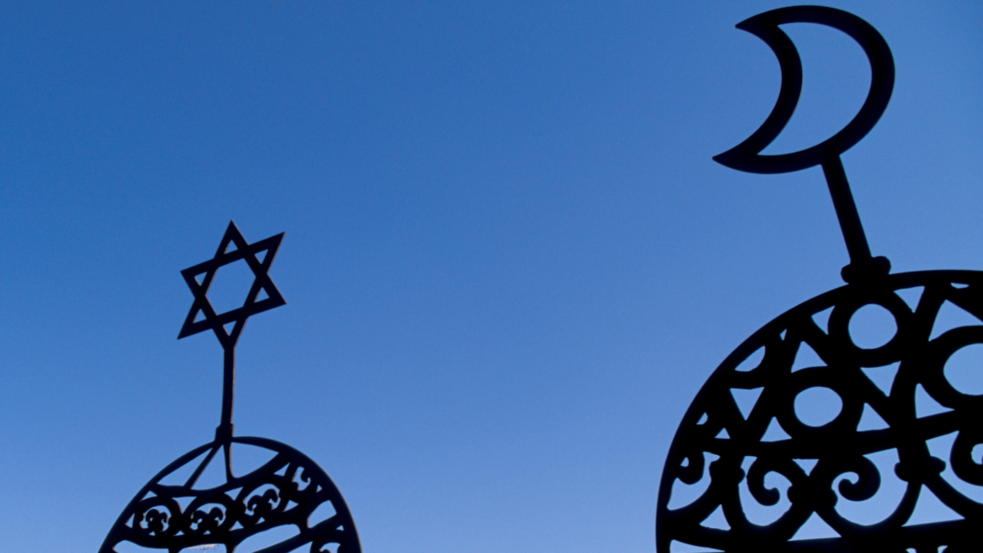 Symbole des Judentums und des Islam nebeneinander. Symbole des Judentums und des Islam nebeneinander.