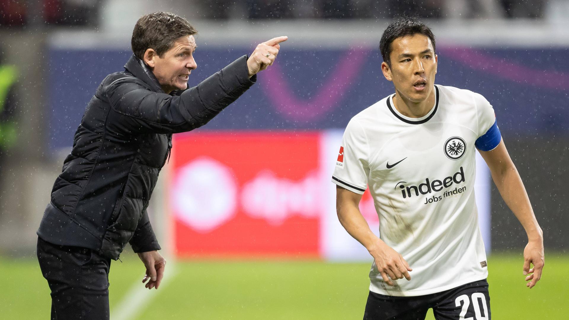 Laut Trainer Oliver Glasner (l.) soll Makoto Hasebe (r.) Blut im Urin gehabt haben. Eintracht Frankfurt relativierte die Aussage. Laut Trainer Oliver Glasner (l.) soll Makoto Hasebe (r.) Blut im Urin gehabt haben. Eintracht Frankfurt relativierte die Aussage.