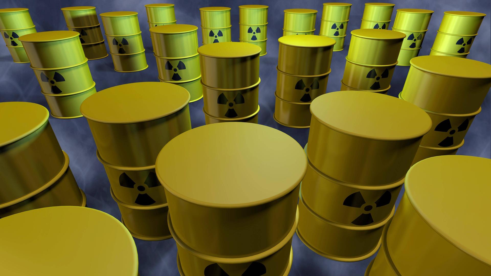 Viele Atommüllfässer stehen in einem Raum. Viele Atommüllfässer stehen in einem Raum.