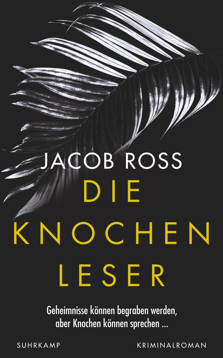 Das Buchcover des Krimis von Jacob Ross, "Die Knochenleser". Jacob Ross und "Die Knochenlesen" steht auf einem meist schwarzem Bild, das oben ein Motiv zeigt, dass an einen Palmenzwei oder ein Knochengerüst erinnert.