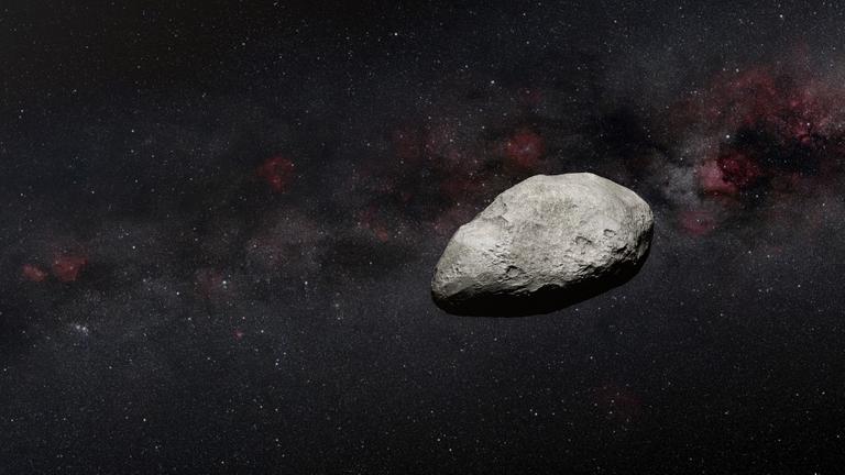Das Foto zeigt einen Asteroiden, einen großen Fels-Brocken im Weltall. Das Foto zeigt einen Asteroiden, einen großen Fels-Brocken im Weltall.