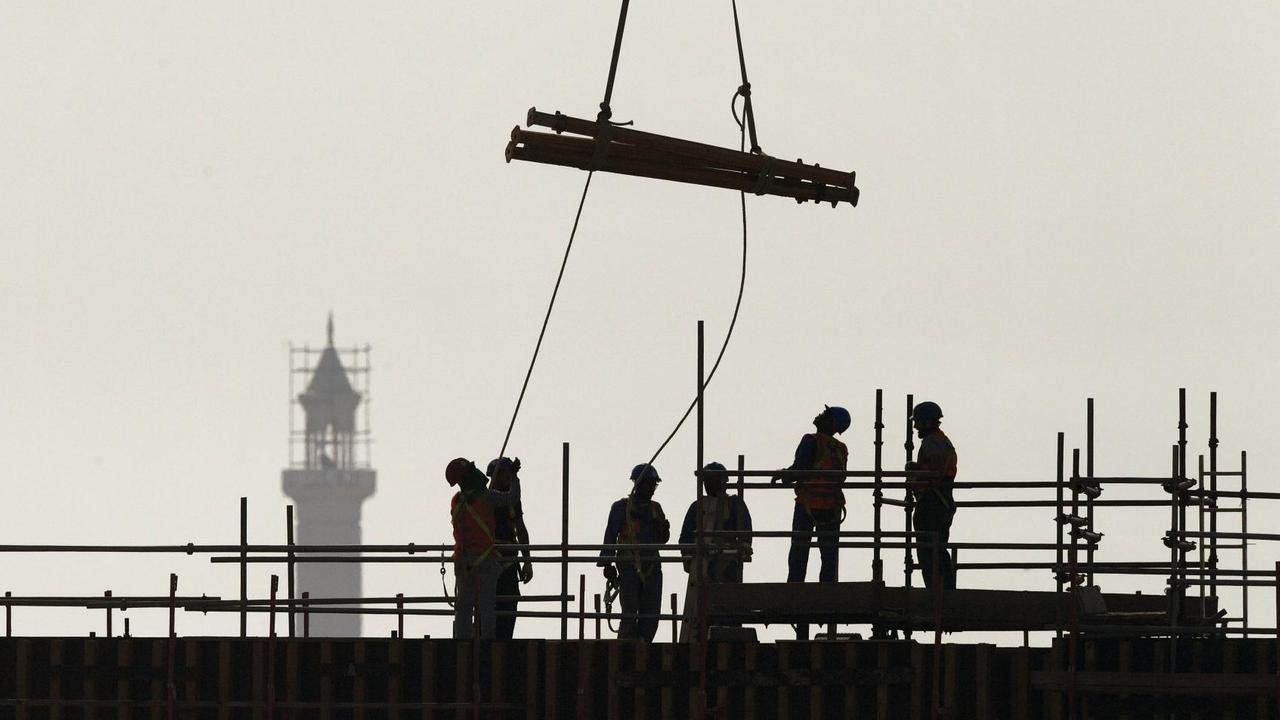 Arbeiter auf einer Baustelle in Doha/Katar Arbeiter auf einer Baustelle in Doha/Katar