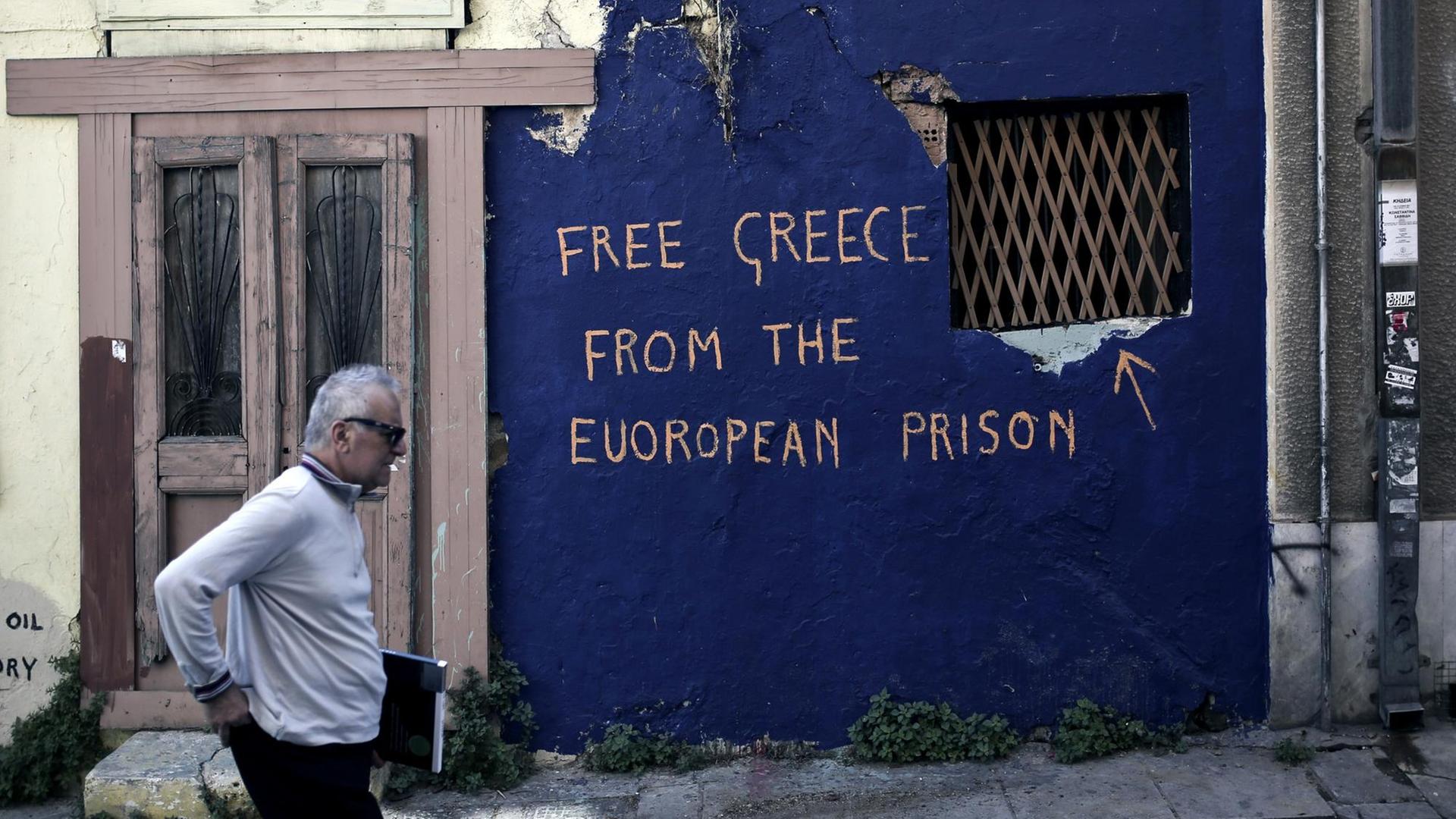 "Befreit Griechenland aus dem Euro-Gefängnis": Ein Grafito an einem leer stehenden Haus in Athen