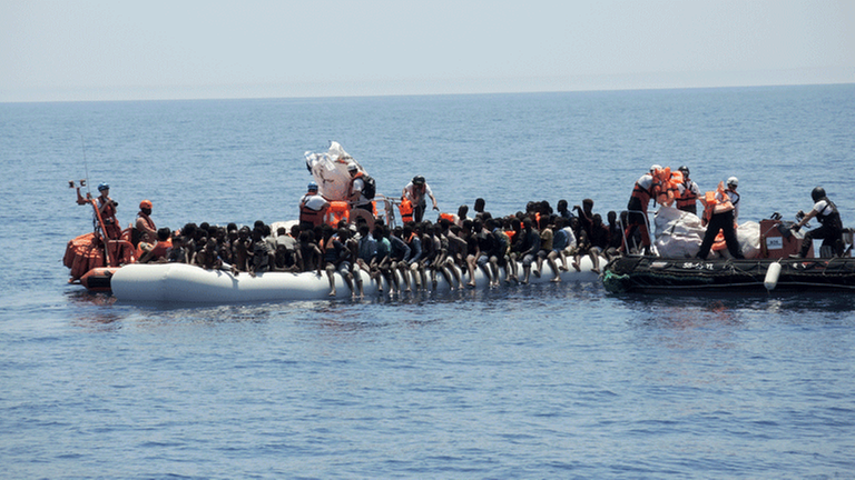 Flüchtlinge in Schlauchbooten