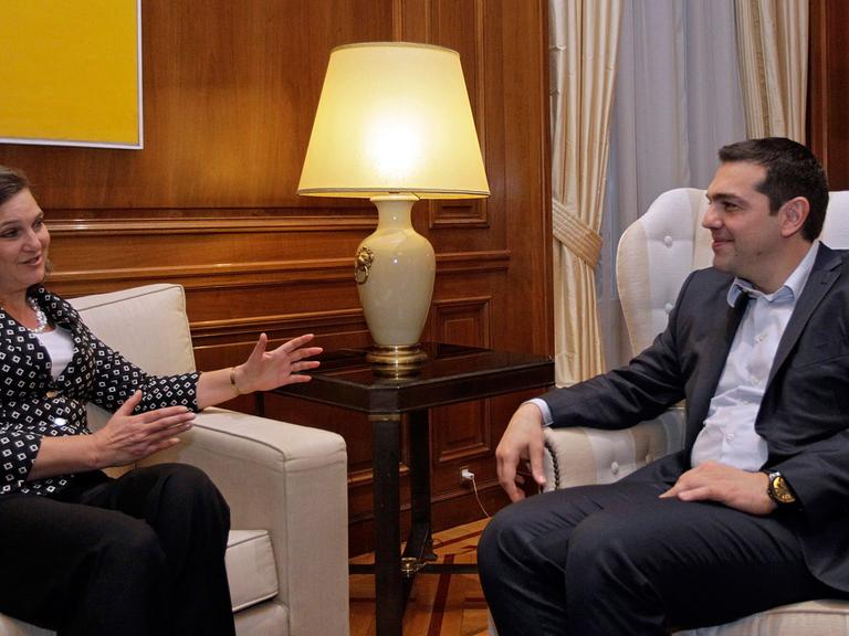 Greek Prime Minister Alexis Tsipras (R) talks with Victoria Nuland (L), Assistant Secretary of State for European and Eurasian Affairs at the United States Department of State, in Athens on 17 March 2015. Victoria Nuland is in Athens on one-day working visit.