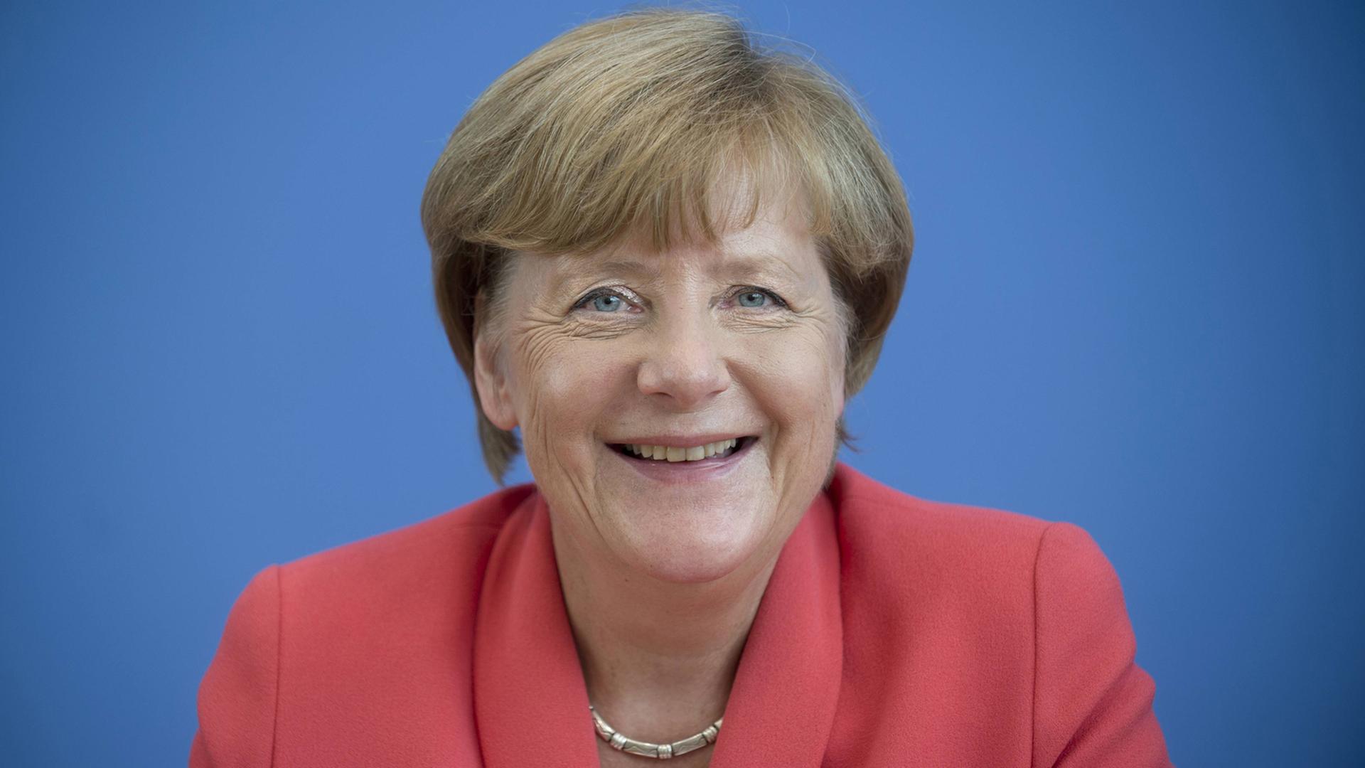 Gute Laune: Kanzlerin Angela Merkel lacht. Gute Laune: Kanzlerin Angela Merkel lacht.