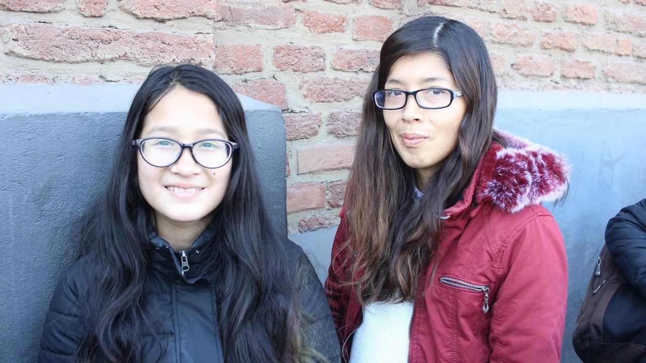 Junge Peruanerin mit Kind Junge Peruanerin mit Kind