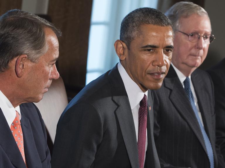 US-Präsident Barack Obama zwischen den Republikanern John Boehner (links) und Mitch McConnell.