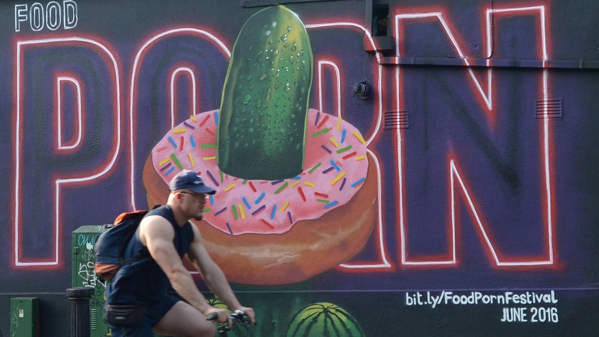 Dublin, Ireland - A cyclist passes near the mural add for the Dublin Food Porn Festival 2016, a new festival which aims to showcase the camera skills of Dublinâ€âä¢s amateur food photographers Dublin, Ireland - A cyclist passes near the mural add for the Dublin Food Porn Festival 2016, a new festival which aims to showcase the camera skills of Dublinâ€âä¢s amateur food photographers