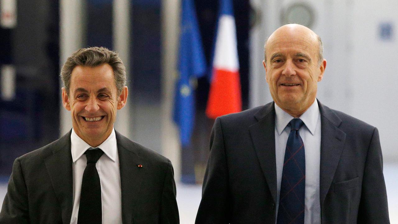 Nicolas Sarkozy und Alain Juppé sind die bekanntesten Gesichter der neuen konservativen Partei "Les Républicains" − und Rivalen um die Präsidentschaftskandidatur.