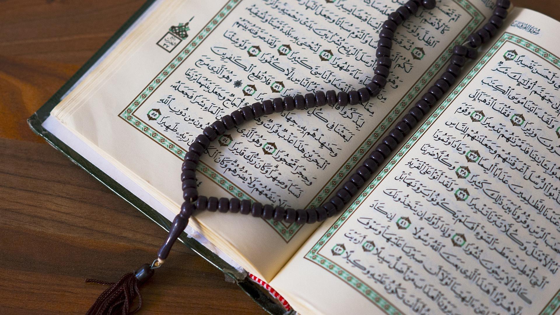 Koran und Gebetskette Koran und Gebetskette