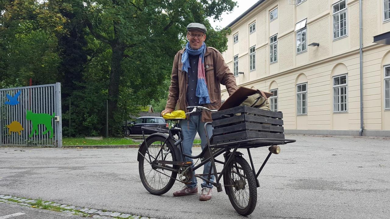 "Stattschreiber" Markus Köhle mit Fahrrad "Stattschreiber" Markus Köhle mit Fahrrad