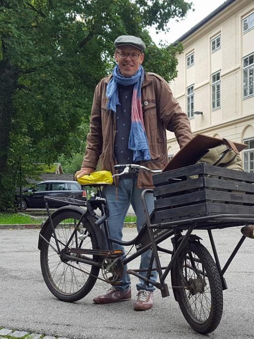 "Stattschreiber" Markus Köhle mit Fahrrad