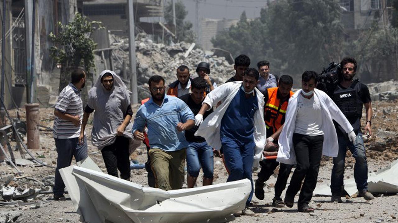 Ãrzte bergen Körper im östlichen Stadtteil von Gaza-Stadt Ãrzte bergen Körper im östlichen Stadtteil von Gaza-Stadt
