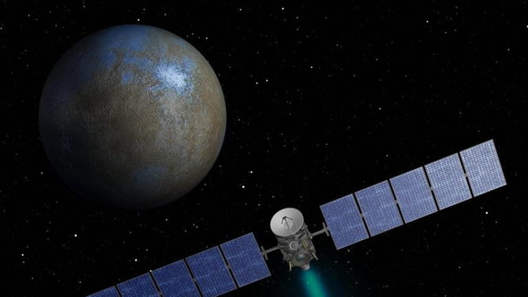 Die Raumsonde Dawn im Anflug auf den Zwergplaneten Ceres (künstlerische Darstellung) Die Raumsonde Dawn im Anflug auf den Zwergplaneten Ceres (künstlerische Darstellung)