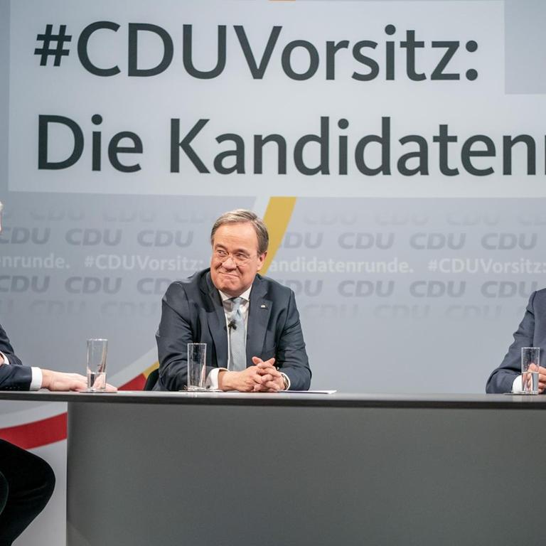 Die drei Kandidaten für den CDU-Parteivorsitz: Norbert Röttgen (l-r), Armin Laschet und Friedrich Merz sitzen nach einer Diskussionsrunde im Konrad-Adenauer-Haus. Vor der Wahl des CDU-Bundesvorsitzenden stellten sich die Kandidaten in der per Livestream übertragenen Diskussion den Mitgliedern. Die drei Kandidaten für den CDU-Parteivorsitz: Norbert Röttgen (l-r), Armin Laschet und Friedrich Merz sitzen nach einer Diskussionsrunde im Konrad-Adenauer-Haus. Vor der Wahl des CDU-Bundesvorsitzenden stellten sich die Kandidaten in der per Livestream übertragenen Diskussion den Mitgliedern.