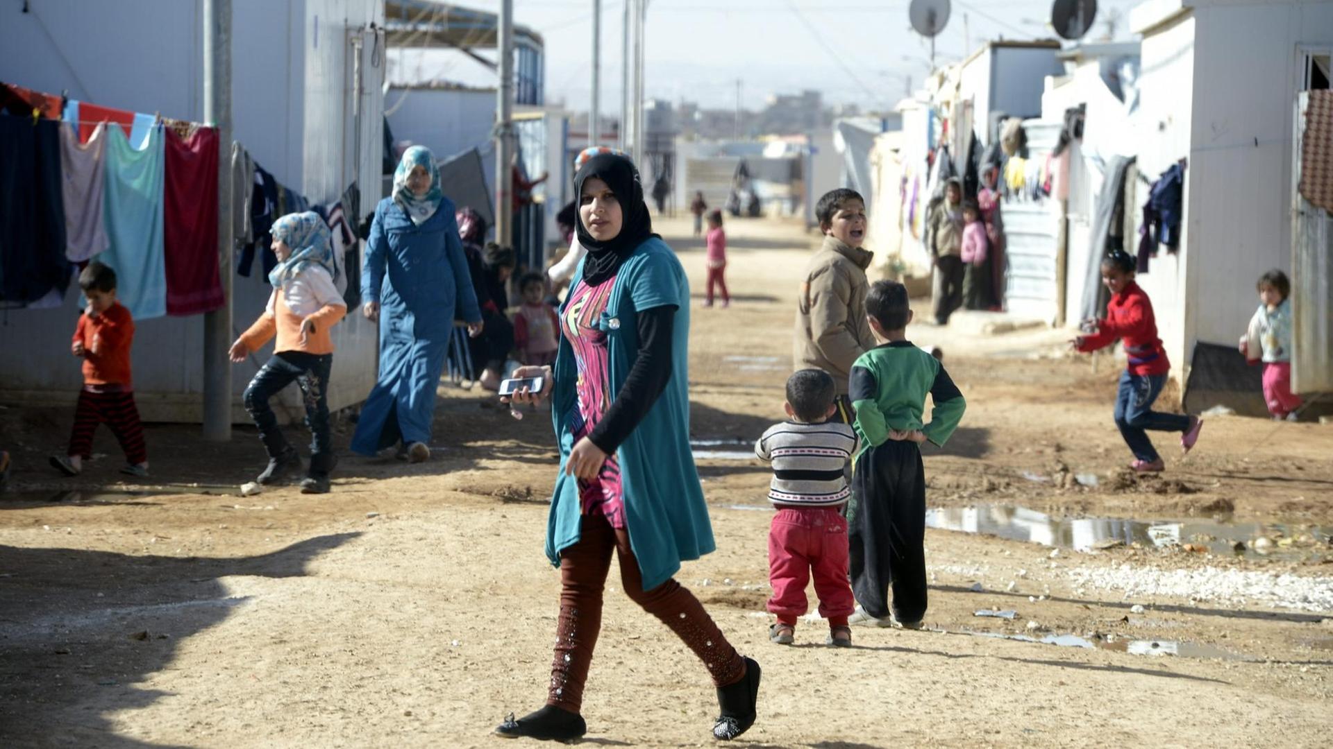 Syrische Kinder in Flüchtlingslager Saatari in Jordanien. Syrische Kinder in Flüchtlingslager Saatari in Jordanien.