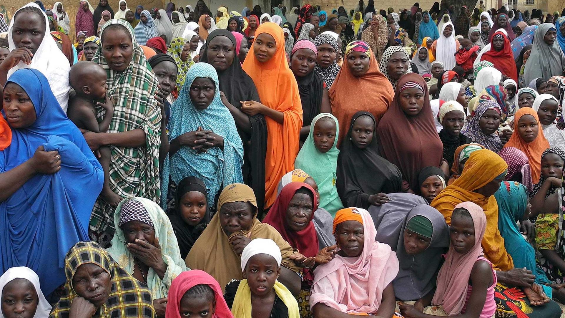 Menschen in Nigeria fliehen vor dem Terror von Boko Haram. Menschen in Nigeria fliehen vor dem Terror von Boko Haram.