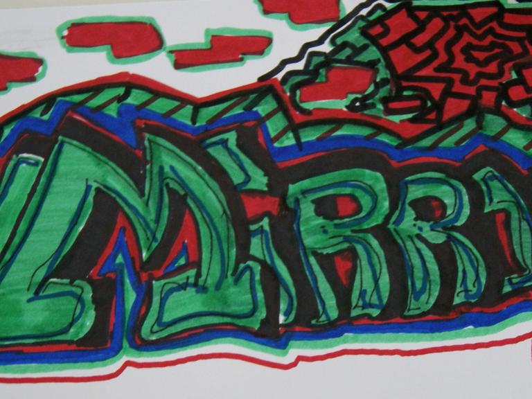 Das autistische Kind Massi hat das Wort "Mirror" zu einem Graffito verarbeitet.