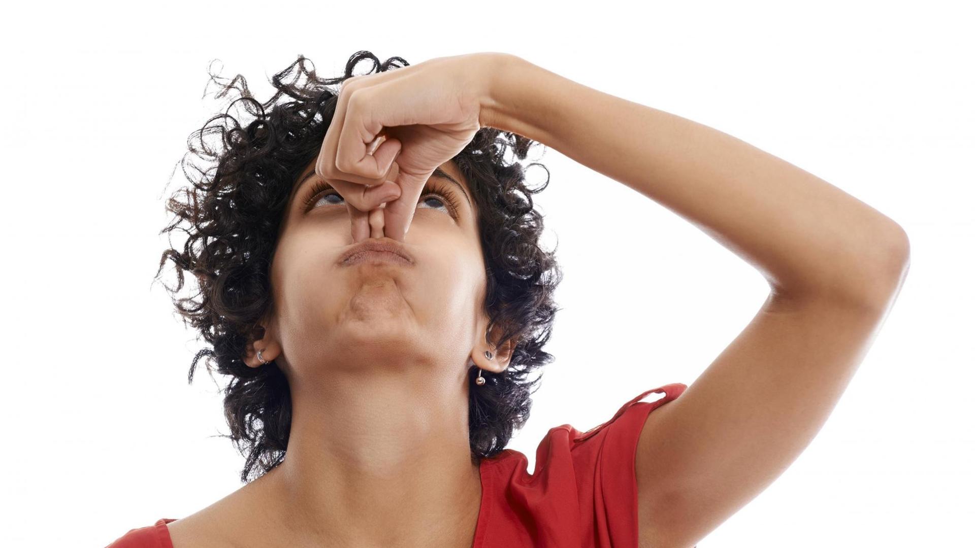 hispanic woman holding breath closing nose with fingers on white background model released Symbolfoto PUBLICATIONxINxGERxSUIxAUTxONLY Copyright: xdiego.cervox Panthermedia10888428 hispanic woman holding breath closing nose with fingers on white background model released Symbolfoto PUBLICATIONxINxGERxSUIxAUTxONLY Copyright: xdiego.cervox Panthermedia10888428