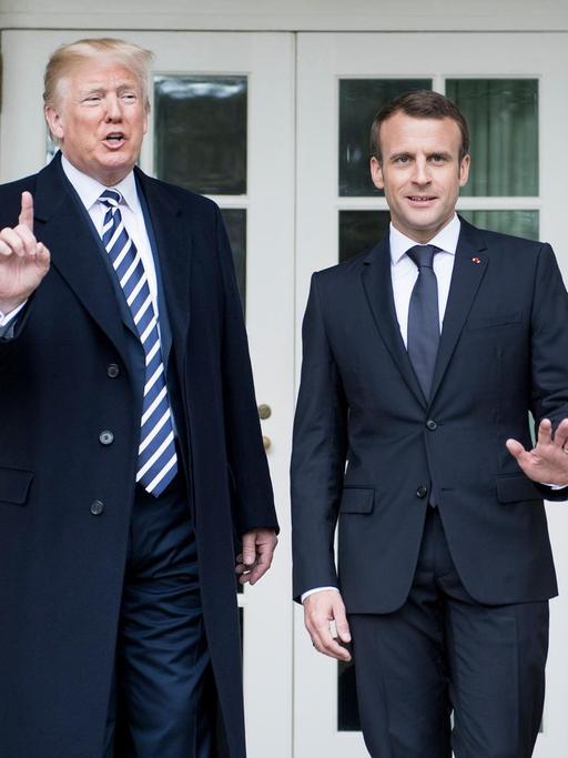 US-Präsident Donald Trump mit Frankreichs Staatschef Emmanuel Macron vor dem Weißen Haus in Washington