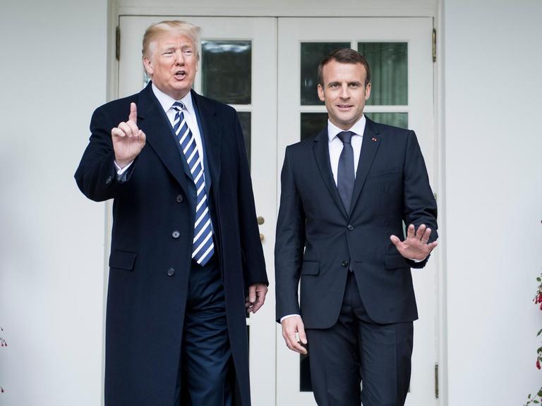 US-Präsident Donald Trump mit Frankreichs Staatschef Emmanuel Macron vor dem Weißen Haus in Washington