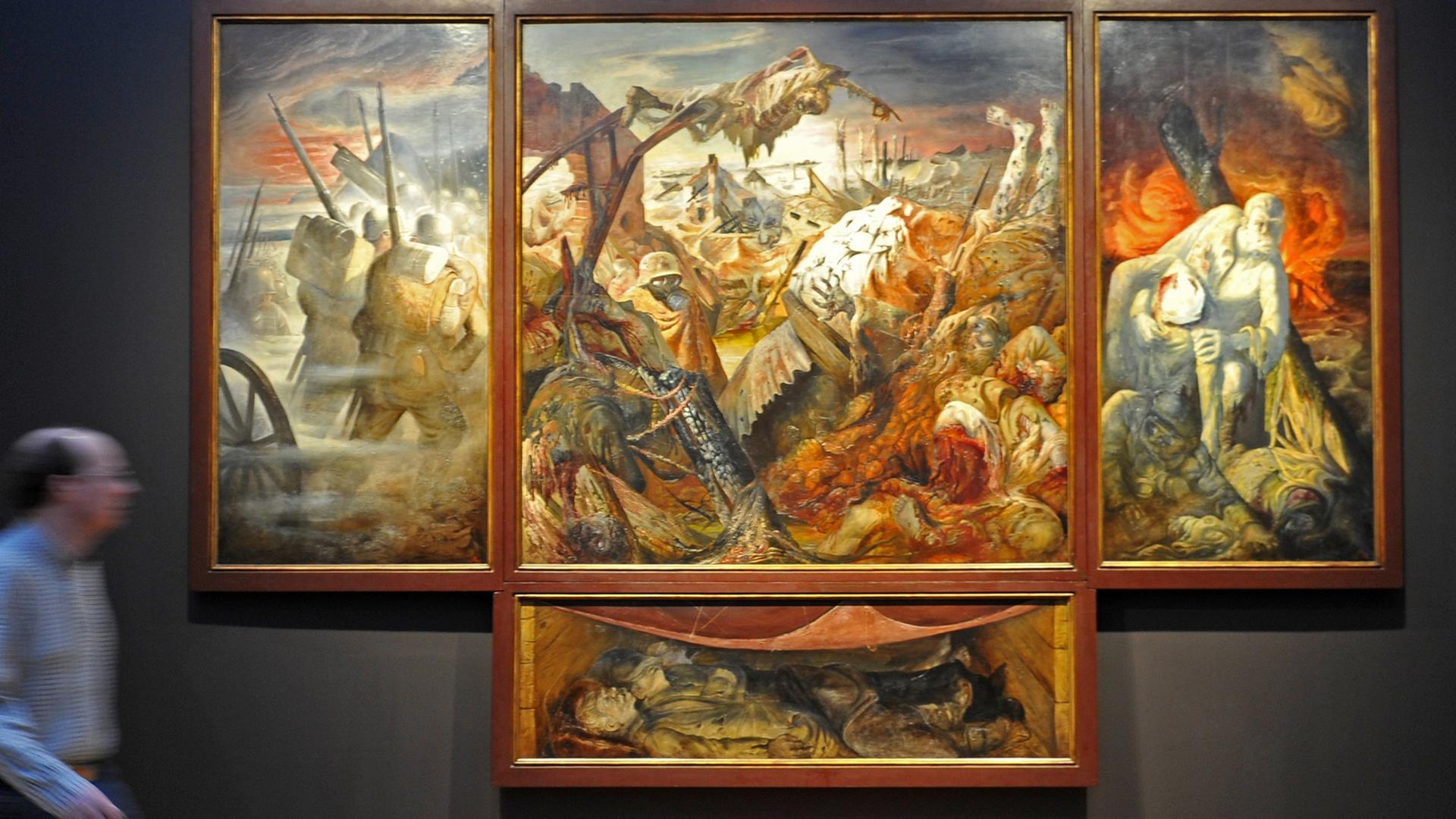 Das Triptychon "Der Krieg" von Otto Dix hängt am 04.04.2014 in Dresden in der Sonderausstellung der Staatlichen Kunstsammlungen im Albertinum. Das Triptychon "Der Krieg" von Otto Dix hängt am 04.04.2014 in Dresden in der Sonderausstellung der Staatlichen Kunstsammlungen im Albertinum.