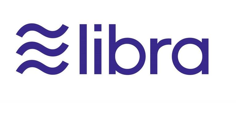 Der Schriftzug und das Logo von Libra, der neuen Kryptowährung von Facebook Der Schriftzug und das Logo von Libra, der neuen Kryptowährung von Facebook