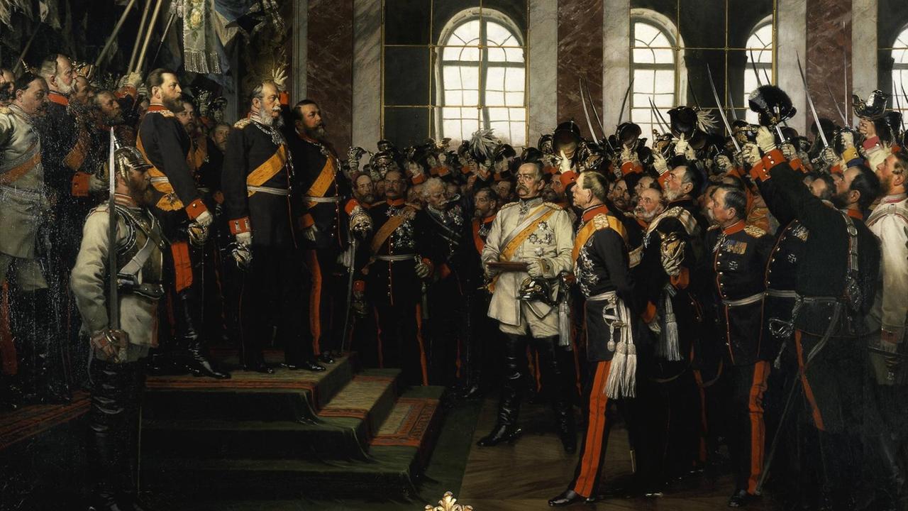 Gemälde von Anton von Werner von 1885 "Die Proklamierung des Deutschen Kaiserreiches zeigt wie König Wilhelm I. von Preußen 1871 im Spiegelsaal des Schlosses von Versailles zum Deutschen Kaiser ausgerufen wird Gemälde von Anton von Werner von 1885 "Die Proklamierung des Deutschen Kaiserreiches zeigt wie König Wilhelm I. von Preußen 1871 im Spiegelsaal des Schlosses von Versailles zum Deutschen Kaiser ausgerufen wird