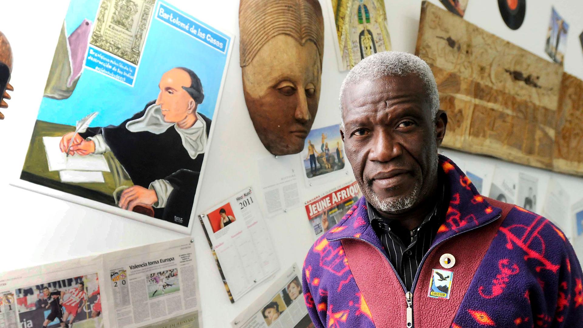 Beninese artist Georges Adeagbo poses next one of his artworks during an interview with Spanish press agency EFE at the Museo de Arte Contemporaneo de Castilla y Leon (MUSAC) in Leon, Spain, 27 January 2011. The MUSAC presents an Adeagbo exhibition, entitled The Mission and the Missionaries, that will be inaugurated on 29 January. Beninese artist Georges Adeagbo poses next one of his artworks during an interview with Spanish press agency EFE at the Museo de Arte Contemporaneo de Castilla y Leon (MUSAC) in Leon, Spain, 27 January 2011. The MUSAC presents an Adeagbo exhibition, entitled The Mission and the Missionaries, that will be inaugurated on 29 January.